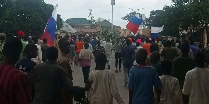 BREAKING: Youths in Zaria Resume #EndBadGovernment Protest, Carrying Russian Flags