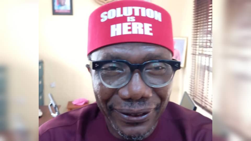 The Red Cap of Solution on Dr Law Mefor’s Head