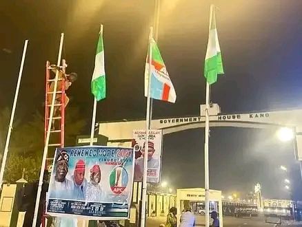 APC Flags Replace NNPP at Kano Government House Ahead of Gov Yusuf’s Return
