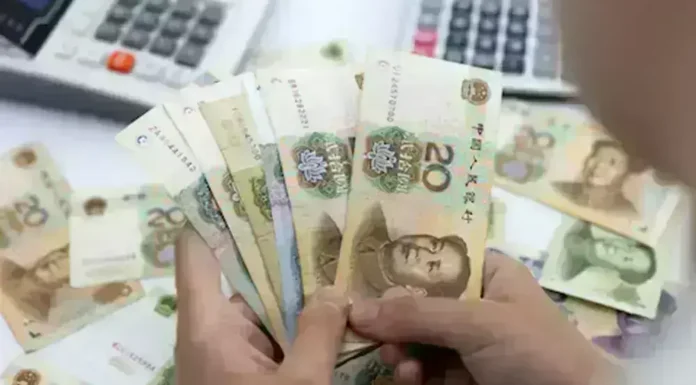 Yuan Dips 24 Pips Against Dollar to 6.8195