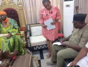 (From Right) The FMC Medical Director, Dr Ekeneam Omo, signing the MoU at the palace of Asagba of Asaba on Tuesday